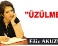 ÜZÜLME!